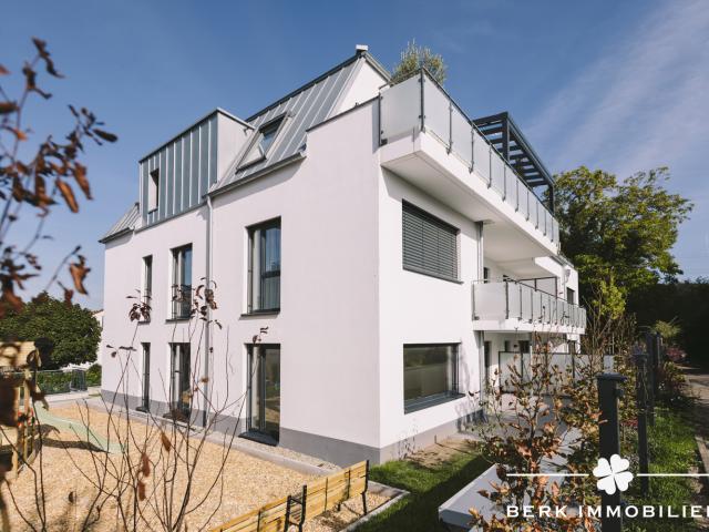 BERK Immobilien 4 Zimmer Neubau Erdgeschosswohnung mit sonniger Terrasse in 1a Lage von Alzenau