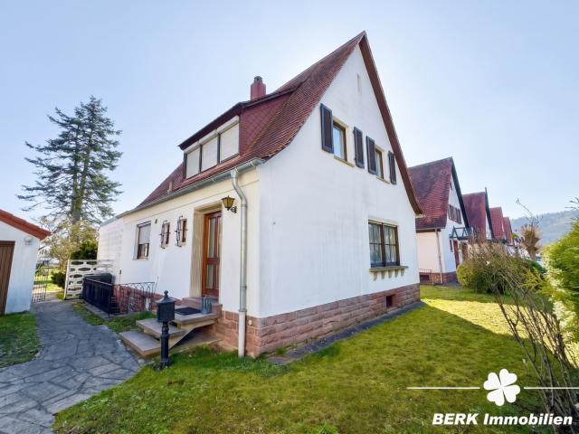 BERK Immobilien – Großzügiges Siedlungshaus mit Anbau & viel Potenzial in ruhiger Lage