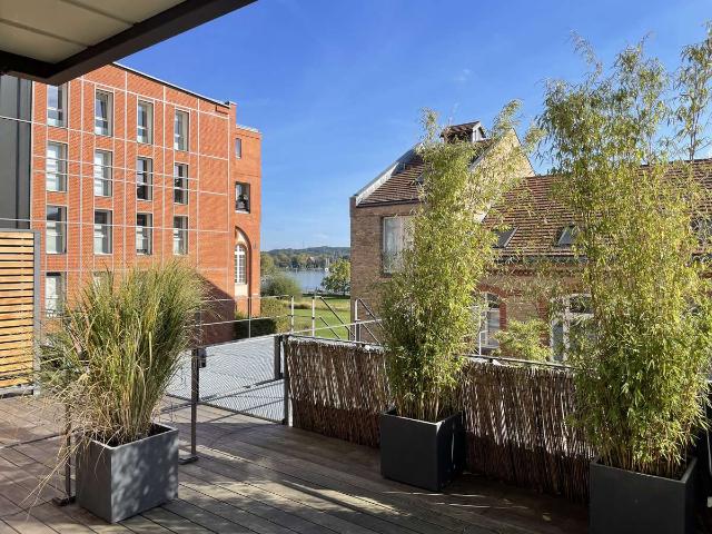 Bestlage am Wasser Barrierefrei mit gr. Terrasse 2Zi. + Garagenplatz mit Wallbox
