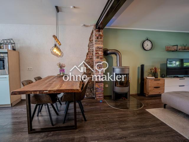 Besondere ETW mit Garten, Dachterrasse, Wallbox und Kamin