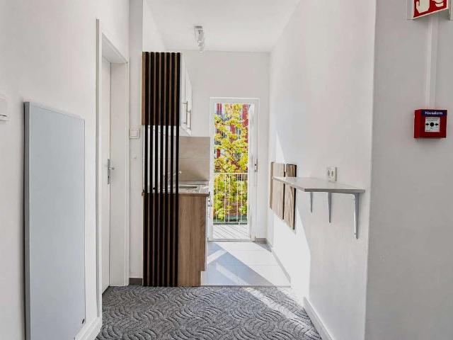 Besonderes Wohnen im Hotelgebäude | 5 Zimmer, 3 Balkone & zentrale Lage