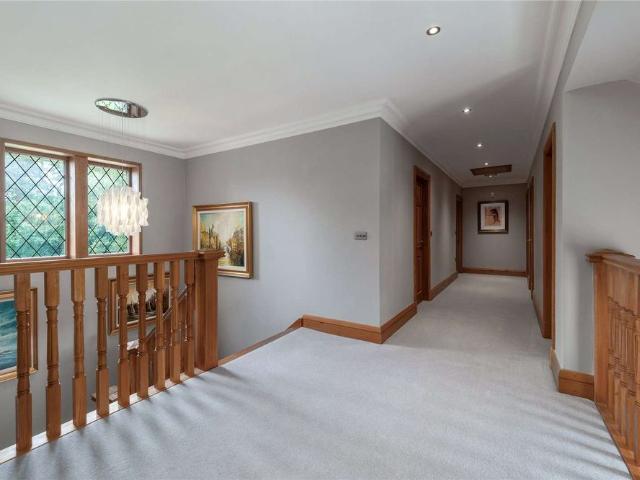 Bespoke built 5 bedroom 6,446 Sq Ft residence in grounds of over an acre on the fringe of the village and countryside