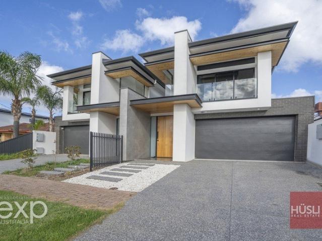 Coastal home with dual masters, 10kW solar & nothing to spend $1,850,000 to $1,950,000!