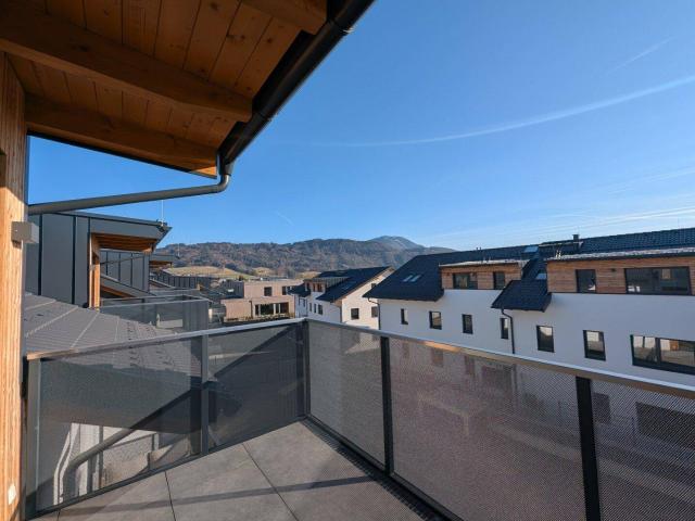 Bezugsfertig ansprechende 4 Zimmer Erstbezugs Dachgeschoss Wohnung mit traumhaftem Ausblick im Ortszentrum Hallwang!