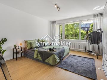 Bezugsfertig modernisiert: 2 Zimmer mit Balkon ins Grüne – Wärmepumpe, Aufzug, Garage