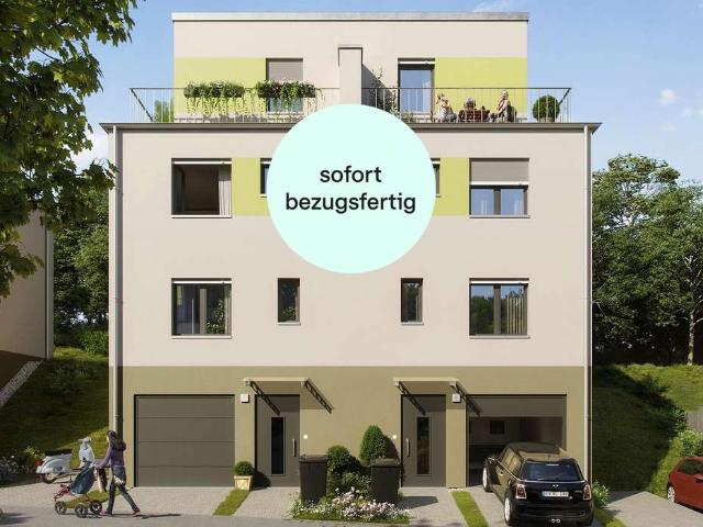 Bezugsfertige Doppelhaushälfte mit zwei Terrassen, Keller und Garage
