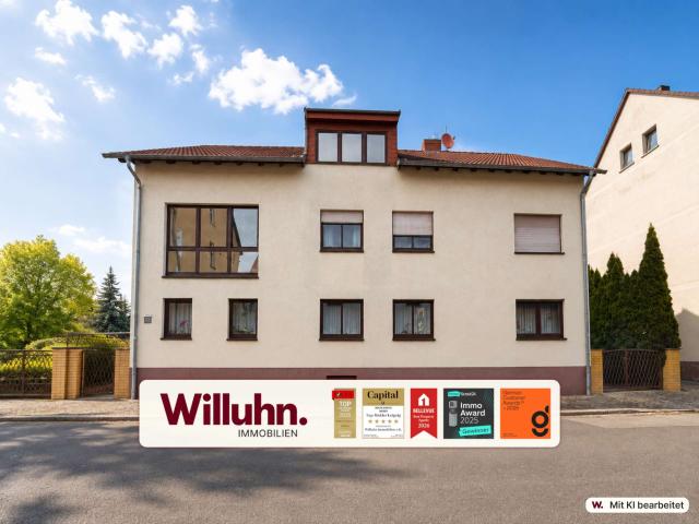 Bezugsfertige Erdgeschosswohnung mit Hauscharakter | Kamin, Gartenanteil & Garage
