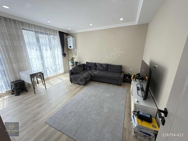BEZİRGANBAHÇE'DE 1+1 SATILIK 1.KAT 60 m2 GÜNEY CEPHE DAİRE