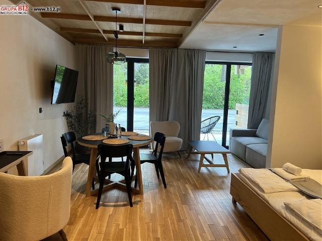 Nowoczesny apartament z ogródkiem i spa w Białce Tatrzańskiej