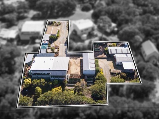 Big block, beautiful home & endless possibilities in picturesque Loch Sport!