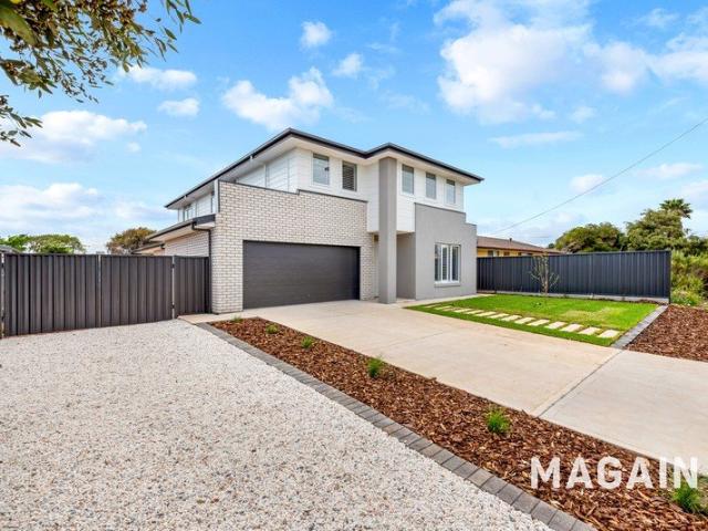 Big, brand new family home close to the beach