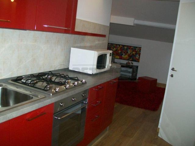 bilocale 56mq