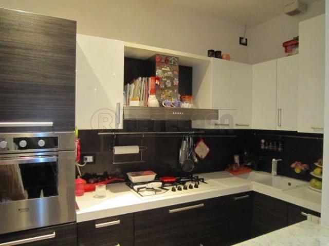 bilocale 56mq