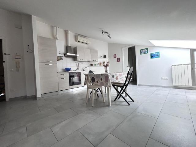 bilocale 65mq