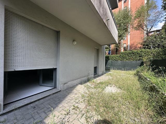 BILOCALE CON CORTILE A LECCO Belledo