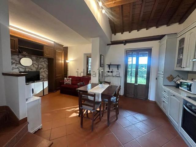 BILOCALE CON GIARDINO E POSTO AUTO