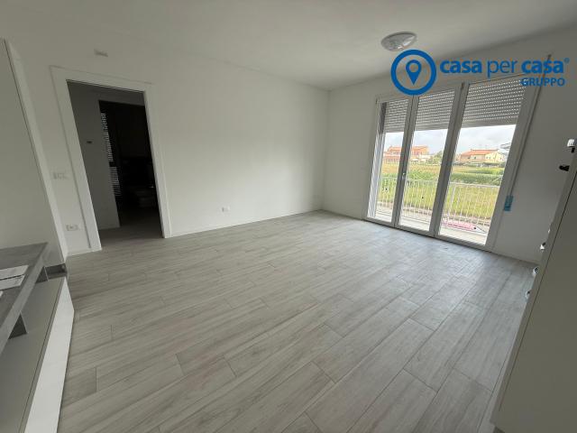 Bilocale con giardinetto e garage