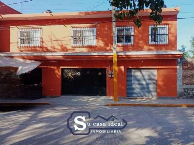 bonita casa con jardin y dos locales comerciales