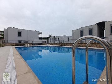 Bodrum Cumhuriyet Mah.Prestijli Havuzlu Site Sıfır Bahçe Kat Satılık 2+1