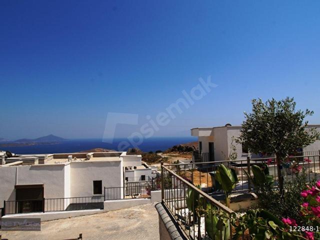 Bodrum Bağla'da Satılık Kısmi Deniz Manzaralı Bahçeli 2+1 Daire