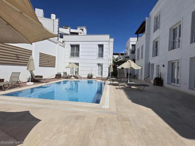 Bodrum Eskiçeşme'de Havuzlu Sitede Satılık 2+1