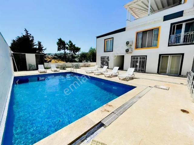 Bodrum Eskiçeşme'de Satılık Havuzlu Lüks 1+1 Daire