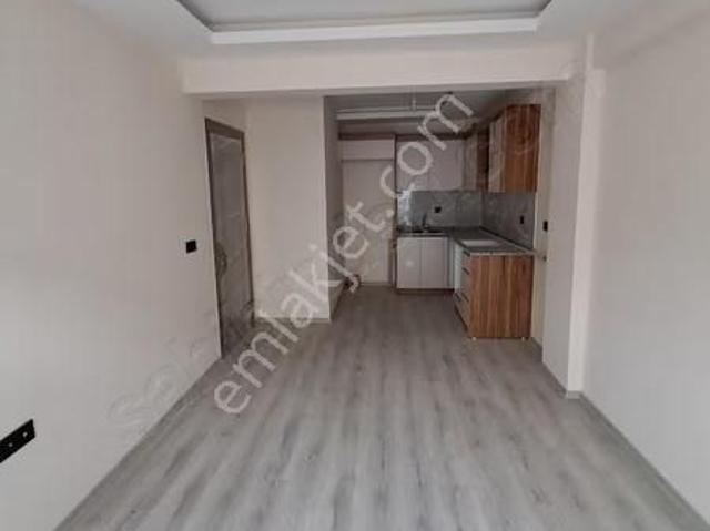 Bornova Merkeze Yürüme Mesafesinde Sıfır Geniş 1+1 Satılık