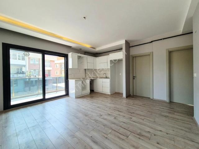 Bornova Atatürk Mahallesi Ferah Hacimli 2+1 Kiralık Daire