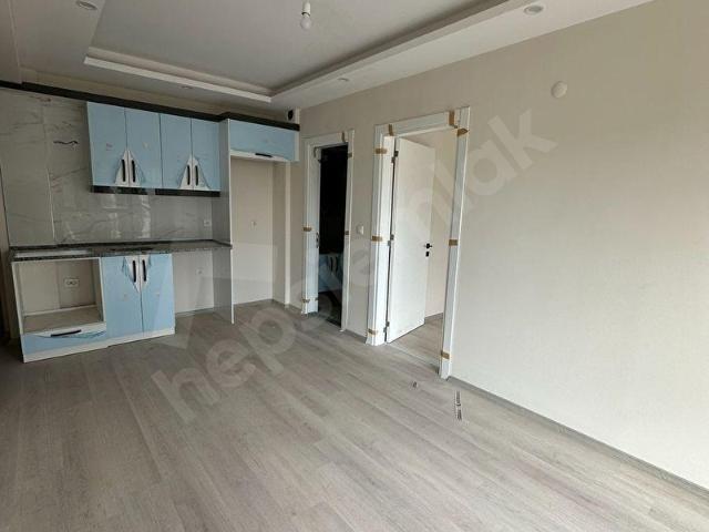 Bornova Kızılay Mahallesinde Satılık 1+1 Daire