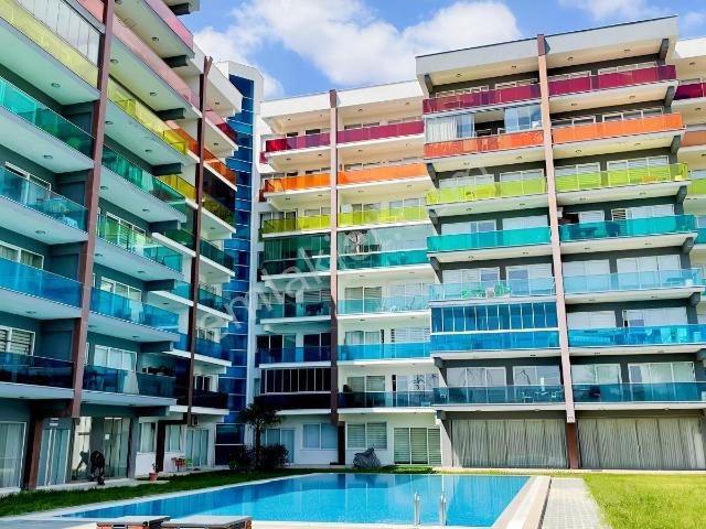 Bornova Park Evlerinde Havuz Cepheli Büyük Tip 1+1 Satılık Daire