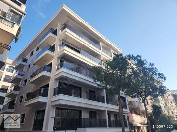 Bostanlı Merkezde Sıfır 2+1 Daire Satılık