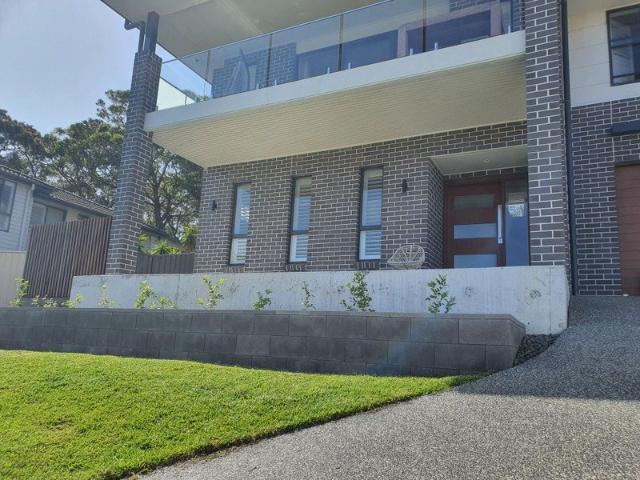 Bottom floor, self contained studio, kitchenette/lounge room, large bedroom, massive walk in robe/ensuite. Water view. Cul de sac. Off street parking