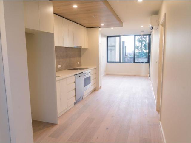 Boutique 2 Bedroom Apartment with Rooftop Terrace in West Melbourne's Wallace Building!