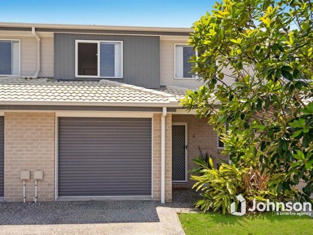 BOUTIQUE TOWNHOUSE OFFERING SPACE, STYLE AND EFFORTLESS BAYSIDE LIVING