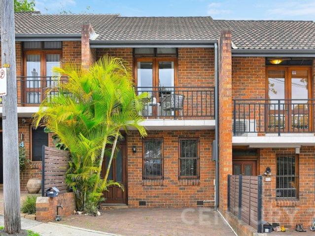 Boutique Townhouse Living with Exciting Potential