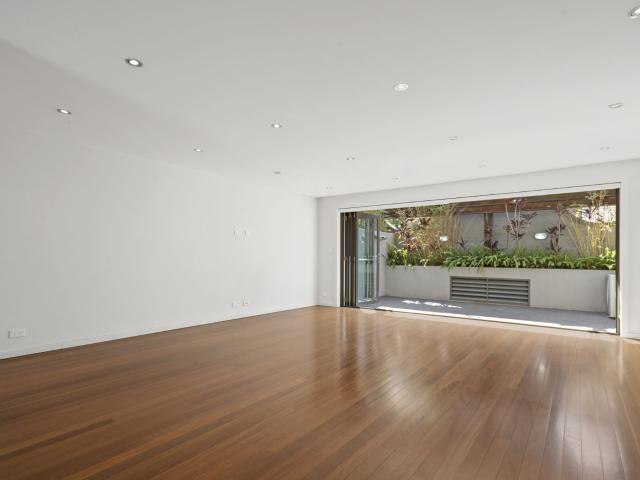 Boutique Two Bedroom Residence with Courtyard & Two Car Spaces