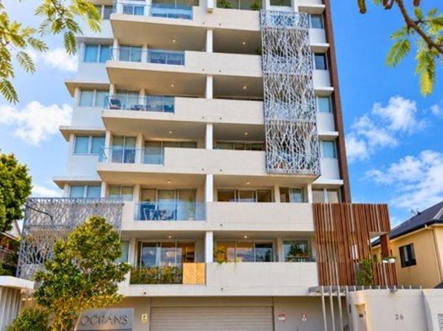 Modern affordable Boutique building. Roof top lounge, walk to the beach
