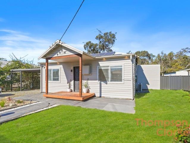 BOUTIQUE COTTAGE CHARM WITH DESIGNER FINISHES, BRAND NEW STUDIO & EXPANSIVE BLOCK