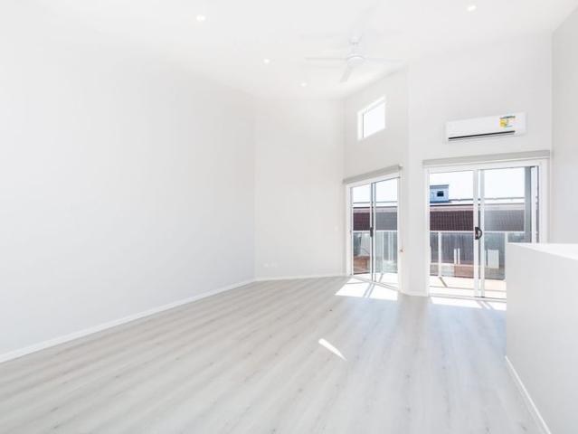 Boutique Living by the Bay Designer Townhouse in Prime Location !