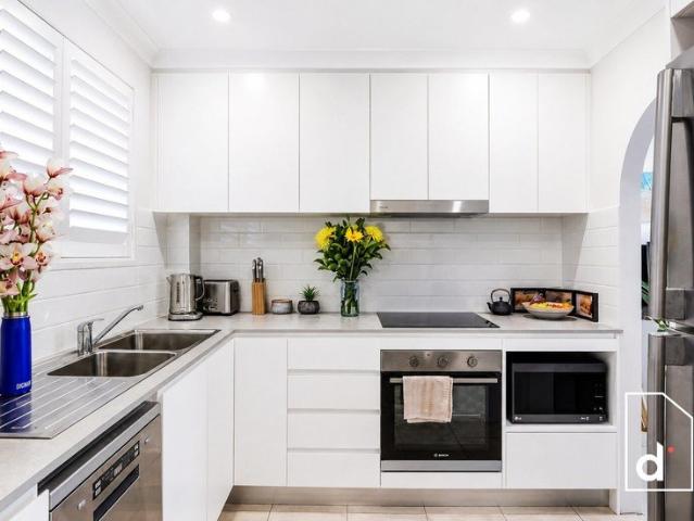 BOUTIQUE LIVING IN THE HEART OF WOONONA
