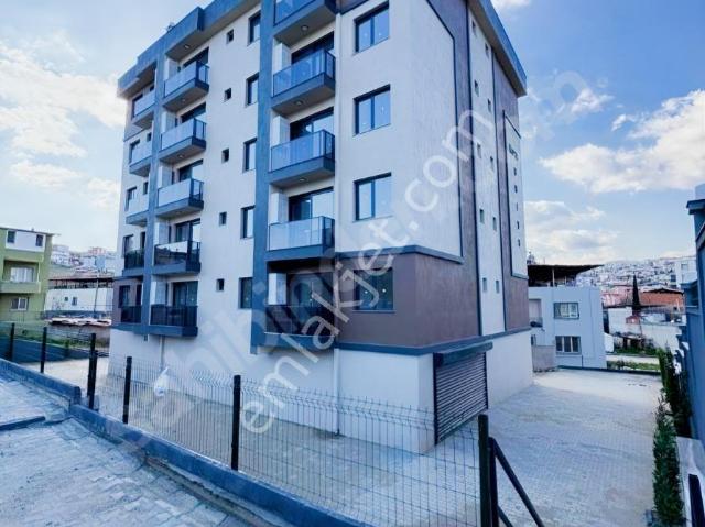 Bozyakada Satılık, Sıfır Binada Balkonlu Ve Otoparklı 1+1 Daire