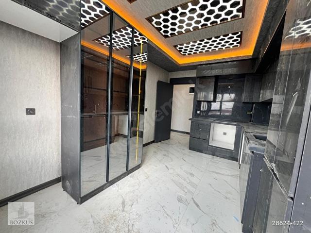 BOZKUŞ EMLAK'TAN AKYURT'TA LÜKS YAPILI, ALTTAN ISITMALI DAİRE