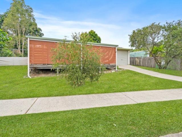Block Home with Side Access and Endless Potential