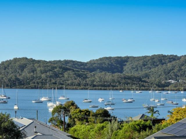 Blue Chip Locale + Stunning Water Views | Dual Living