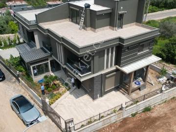 Bmden Kuyulukta Doğa Manzaralı asansörlü saunalı 5+1 İkiz Villa