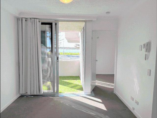 Broadwater Views | Modern Ground Floor Apartment | Prime Marine Parade Position