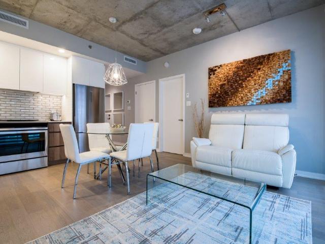 Brossard Furnished Condo for Rent at Solar Uniquartier Delightful 1 Bed, 1 Bath with Exposed Concrete Ceiling and Balcony