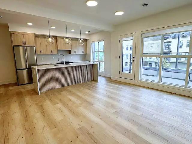 Brand New 3 Bed Townhome in University District | Attached Garage + 2 Balconies
