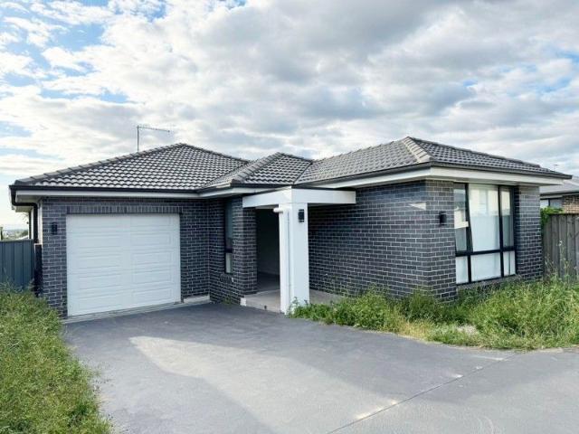 Brand New 4 Bedroom Home sitting on a Huge Block of Land