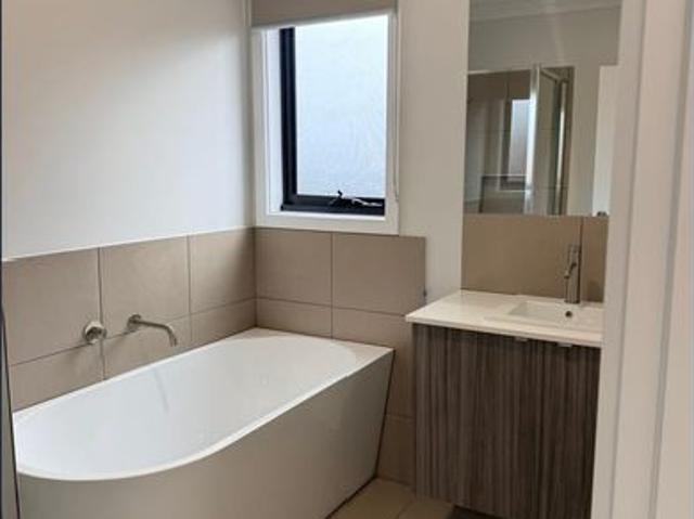 Brand New 4 Bedroom, 2 Bathroom Home on an Easy to Maintain Block